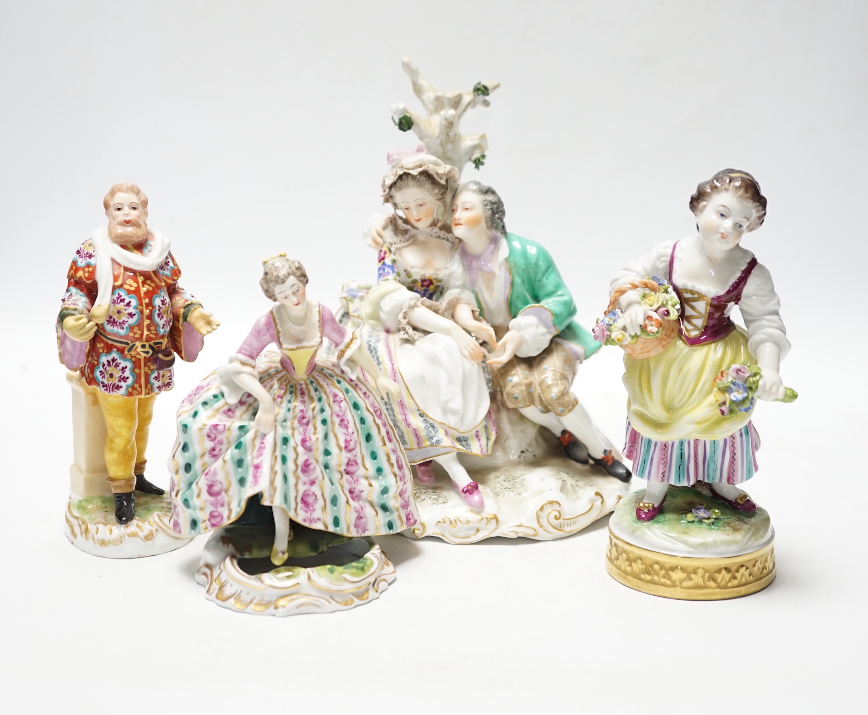 Four Continental porcelain figures or groups, tallest 19cm